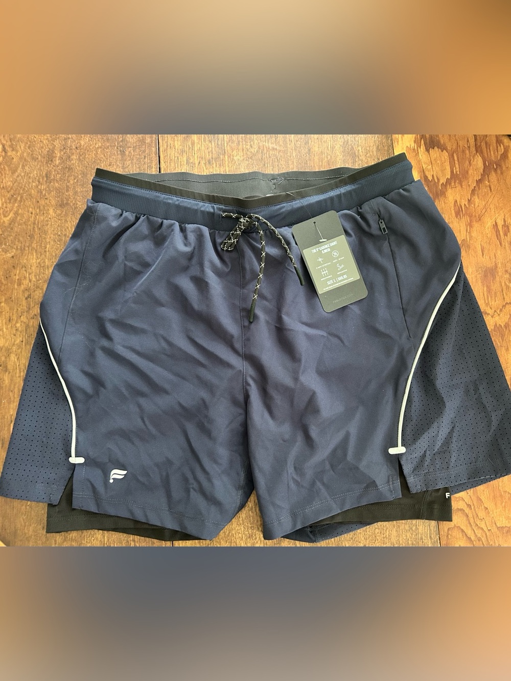 NWT Fabletics The 5” Kadence Short lined. Navy and Black